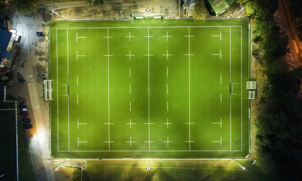 Illuminated-rugby-stadium-in-evening Illuminated-rugby-stadium-in-evening