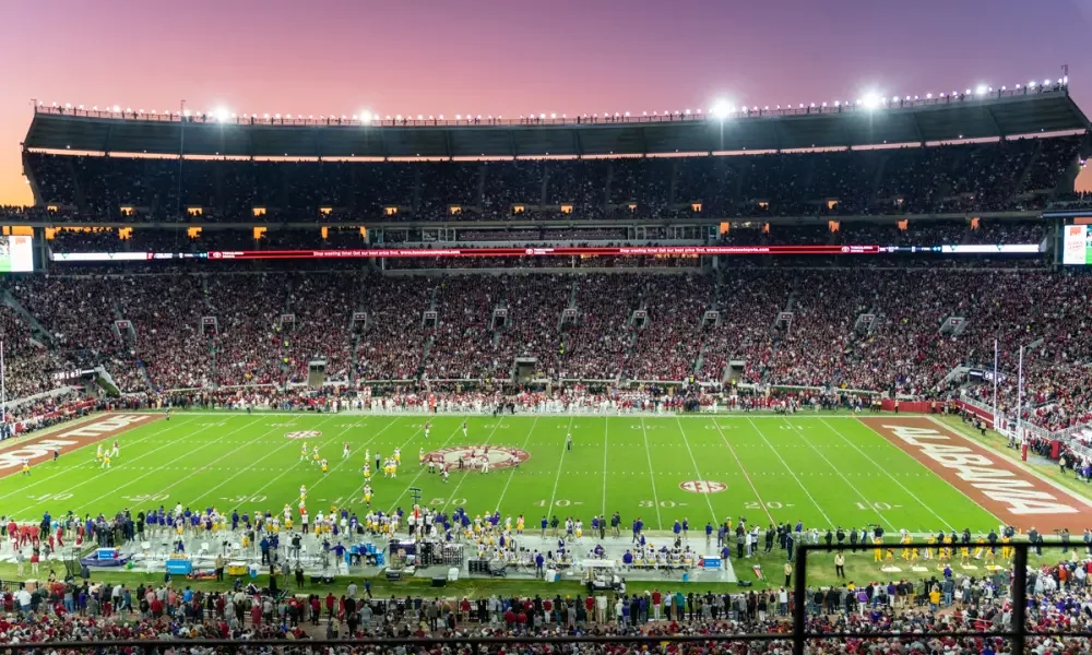 football-stadium-glowing-under-floodlights football-stadium-glowing-under-floodlights